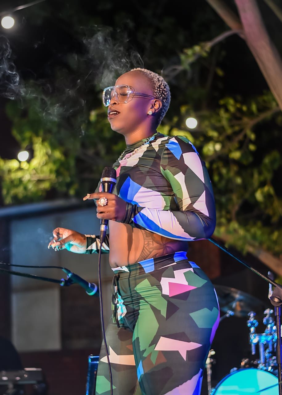 Mizz Gabbzz performing with smoke effects